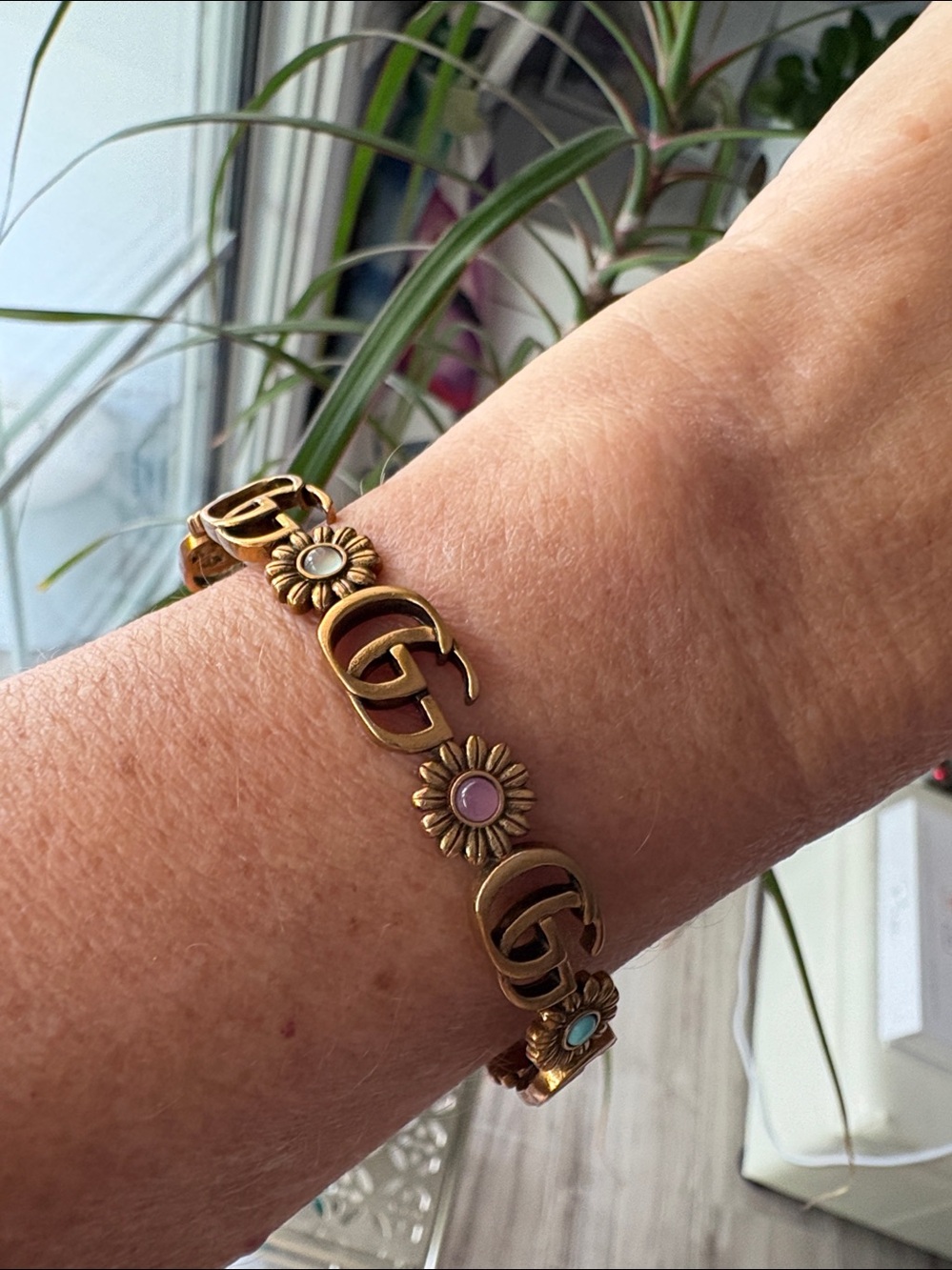 Gucci Old Gold Tone GG Daisy Bracelet with Pink and Turquoise Enamel Accents - Picture 3 of 9